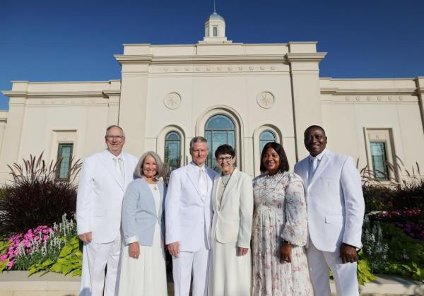 Church leaders and their wives are seen outside the Bentonville Arkansas Temple before its dedication on Sunday, Sept. 17, 2023.