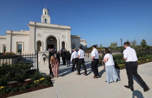 Attendees walk into the Bentonville Arkansas Temple for its first dedicatory session on Sept. 17, 2023.