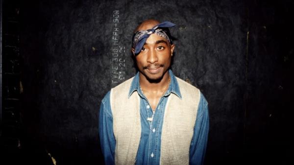 Rapper Tupac Shakur poses for photos backstage after his performance at the Regal Theater in Chicago, Illinois, in March 1994.    - Raymond Boyd/Michael Ochs Archives/Getty Images