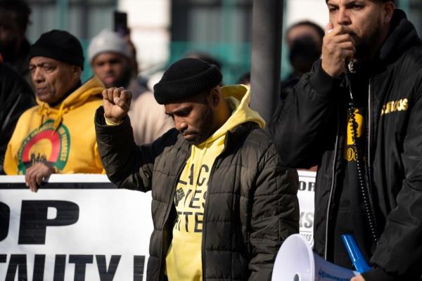 (Center) Zellie Thomas, an organizer for Black Lives Matter Paterson, before the start of a press co<em></em>nference calling for justice for Najee Seabrooks and local and state accountability at 200 Federal Plaza in Paterson on Thursday, March 16, 2023. Seabrooks, a member of the violence intervention group the Paterson Healing Collective, was fatally shot by Paterson police after a standoff while he was barricaded inside an apartment.
